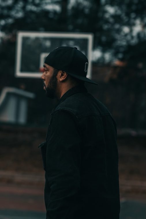 Outdoor portrait beside a basketball court