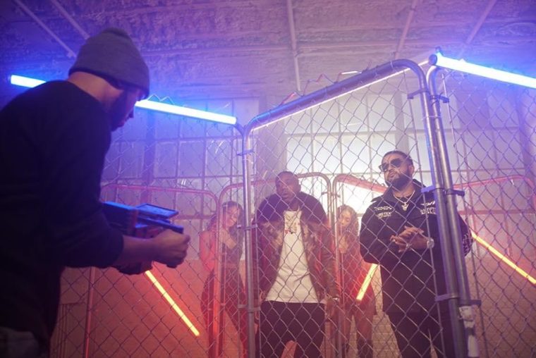 Camera work on a neon-lit set